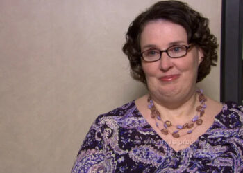Phyllis Smith's Phyllis Vance sits in an interview room in The Office