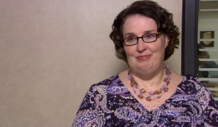 Phyllis Smith's Phyllis Vance sits in an interview room in The Office