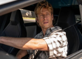 Glen Powell as Russ Holliday in Chad Powers. .