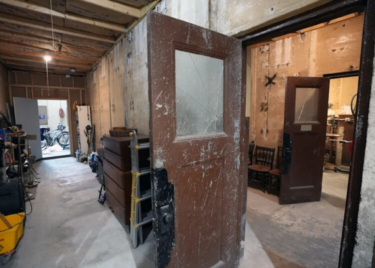 Don Percy's 1839 Milwaukee warehouse-turned-home features a series of 90-foot-long hallways separated by doors with cracked windows. The home is featured on the "Monsters of the Midwest" episode of the HGTV series "Scariest House in America."