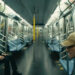 Elliott talks to Mr. Robot in a subway train