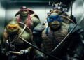 Raphael, Donnie, Mikey, and Leo in an elevator in "Teenage Mutant Ninja Turtles" (2014)