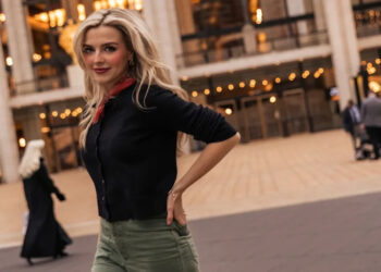 Anna Grace Barlow posing in front of Lincoln Center in Manhattan.