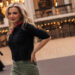 Anna Grace Barlow posing in front of Lincoln Center in Manhattan.