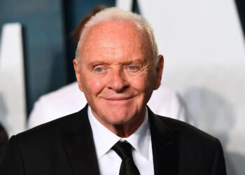 Anthony Hopkins wears black suit
