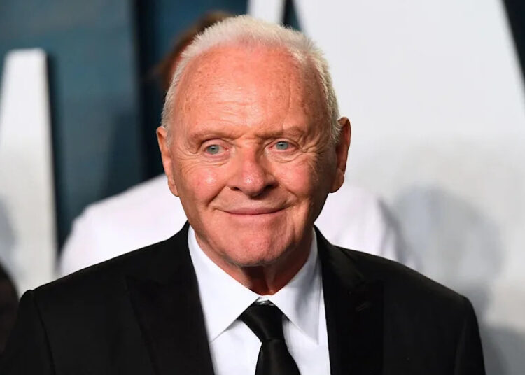 Anthony Hopkins wears black suit