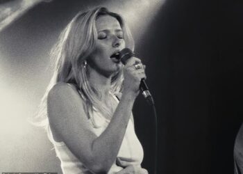 Chris Martin and Gwyneth Paltrow 's daughter Apple has released a new music video after her debut was slammed as an 'off-key drunken karaoke performance'