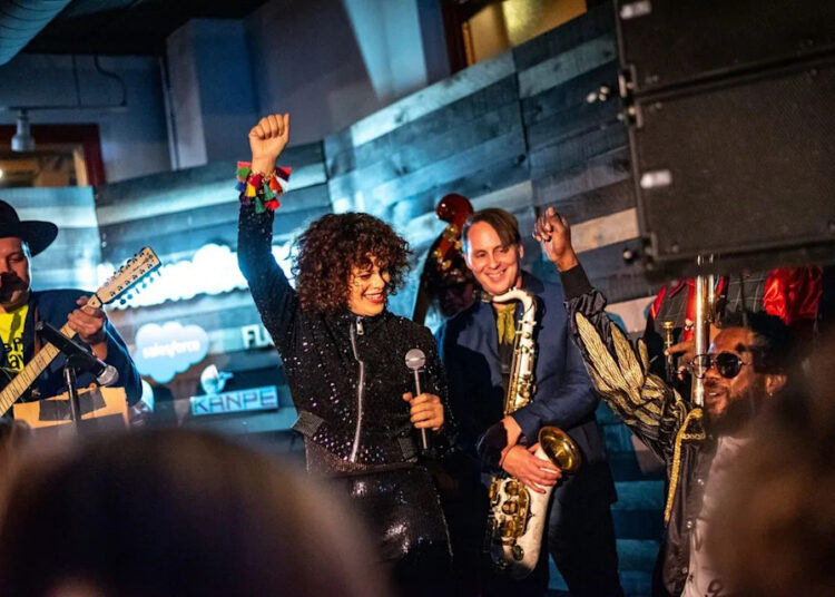 Tommy Elbrecht / #MakeChangeSeries at Salesforce Music Lodge Win Butler (far right) and Régine Chassagne (center)