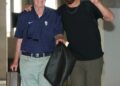 Kansas City Royals broadcaster Denny Matthews, left, and outfielder John Rave walk into Kauffman Stadium prior to a game this season at Kansas City.