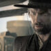 Anson Mount as Cullen Bohannon wearing dark clothing and looking angry on Hell on Wheels