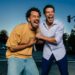 Actors Marlon Alexander Vargas and Alex Hernandez, actors in the play "Littleboy/Littleman," hold onto each other as they laugh and yell outside.