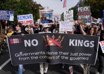 "No Kings" protesters march Saturday toward the National Mall in Washington, D.C.