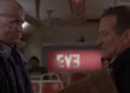 Robin Williams' Alan Hakman looking nervous facing a man with facial tattoos in The Final Cut