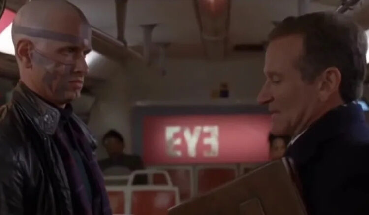 Robin Williams' Alan Hakman looking nervous facing a man with facial tattoos in The Final Cut