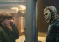 Ethan Hawke as The Grabber facing down with Mason Thames as Finn in the phone booth in Black Phone 2