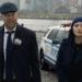 Danny Reagan and Maria Baez next to a cop car "Blue Bloods"