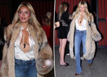 Brooks Nader suffers wardrobe malfunction as she spills out of unbuttoned blouse