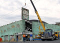 "Tillie" is lifted out with a crane to be preserved at Palace Amusements in Asbury Park, New Jersey, on June 11, 2004.