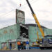 "Tillie" is lifted out with a crane to be preserved at Palace Amusements in Asbury Park, New Jersey, on June 11, 2004.