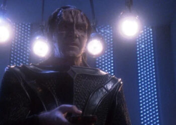 Gul Madred, surrounded by four lights in Star Trek: The Next Generation