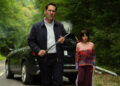 Elliot (Paul Rudd) and Ridley (Jenna Ortega) investigate the situation after they hit a unicorn with their SUV in "Death of a Unicorn."