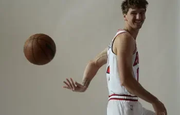 Sep 29, 2025; Chicago, IL, USA; Chicago Bulls forward Matas Buzelis (14) poses for photos during Chicago Bulls Media Day.