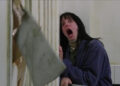 Wendy Torrence screaming as an axe breaks through bathroom door in "The Shining"