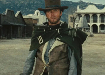 Joe wearing a serape in the street in A Fistful of Dollars