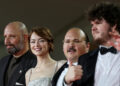 Director Yorgos Lanthimos, cast members Emma Stone, Aidan Delbis and Stavros Halkias pose on the red carpet for the screening of the movie "Bugonia" in competition, at the 82nd Venice Film Festival, in Venice, Italy, on Aug. 28, 2025.