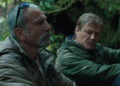 Daniel Day Lewis as Ray leaning up against a log talking to Sean Bean as Jem in Anemone