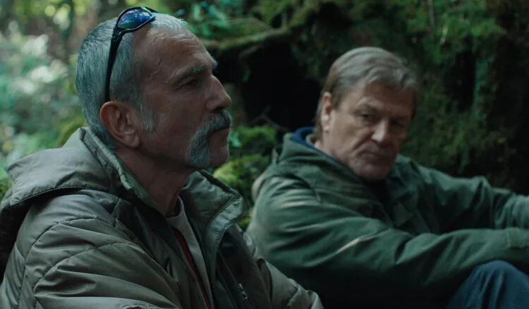 Daniel Day Lewis as Ray leaning up against a log talking to Sean Bean as Jem in Anemone