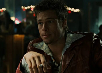 Brad Pitt as Tyler Durden smoking a cigarette in a restaurant in Fight Club