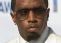 Diddy in white suit
