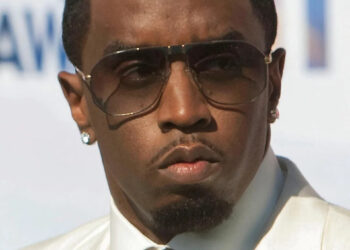 Diddy in white suit