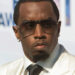 Diddy in white suit