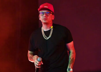 ATLANTA, GEORGIA - AUGUST 12: Rapper Logic performs onstage during