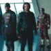 thunderbolts, a group of characters in combat outfits standing in a modern high rise building