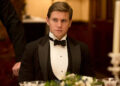 Suit, Formal wear, Tuxedo, Event, Smile, Bow tie,