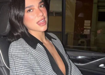 Instagram/Dua Lipa Dua Lipa goes topless under her plunging preppy blazer in New York