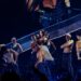 Dua Lipa sings and dances with backup performers