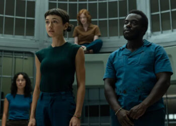 Wendy and the Lost Boys standing in a cage at Neverland in Alien: Earth