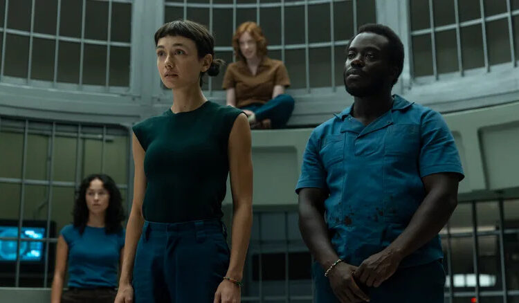 Wendy and the Lost Boys standing in a cage at Neverland in Alien: Earth