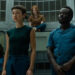 Wendy and the Lost Boys standing in a cage at Neverland in Alien: Earth