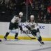 Everett Silvertips defenseman Tarin Smith, foreground, works the puck on the evening of the Nov. 22 game between the Silvertips and the Spokane Chiefs held at Angel of the Winds Arena in Everett.
