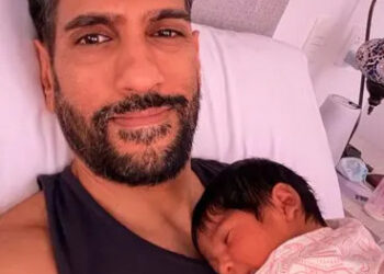 Amrit Kapai  Amrit Kapai with his newborn daughter