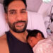 Amrit Kapai  Amrit Kapai with his newborn daughter