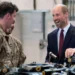 PA Media The Prince of Wales (right) helps work on a main rotor head of a Chinook helicopter as he meets helicopter technicians from No. 28 (AC) Sqn during a visit to RAF Benson in Wallingford, Oxfordshire.