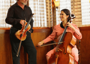 Hall of Fame fiddler Alasdair Fraser and cellist Natalie Haas, pictured here with their string instruments, will perform at three Folk Orchestra concerts Nov. 7-9. (Courtesy photo)