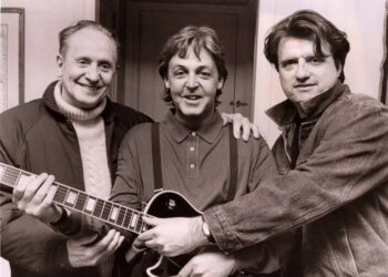 Publicist Joe Dera, right, with Les Paul, left, and Paul McCartney. Dera was McCartney's spokesman for over 20 years. Dera, who grew up in New Jersey, died on Oct. 10, 2025.