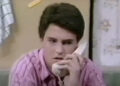 Matthew Perry's Charles Russell talks on a phone in Second Chance